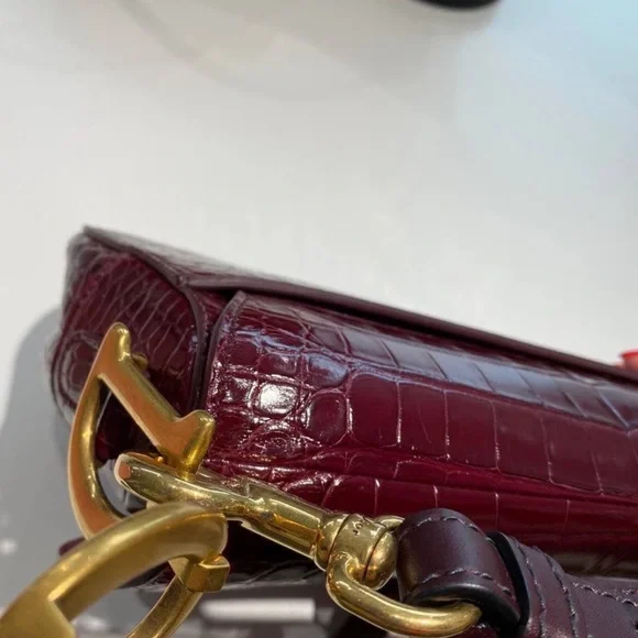 Metallic Burgundy Shiny Alligator Saddle Bag Gold
Hardware - Picture 8 of 11